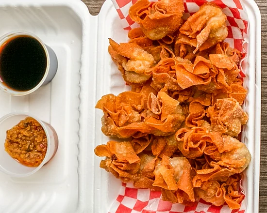 Fried pork siomai with soylime and chili garlic dipping sauces